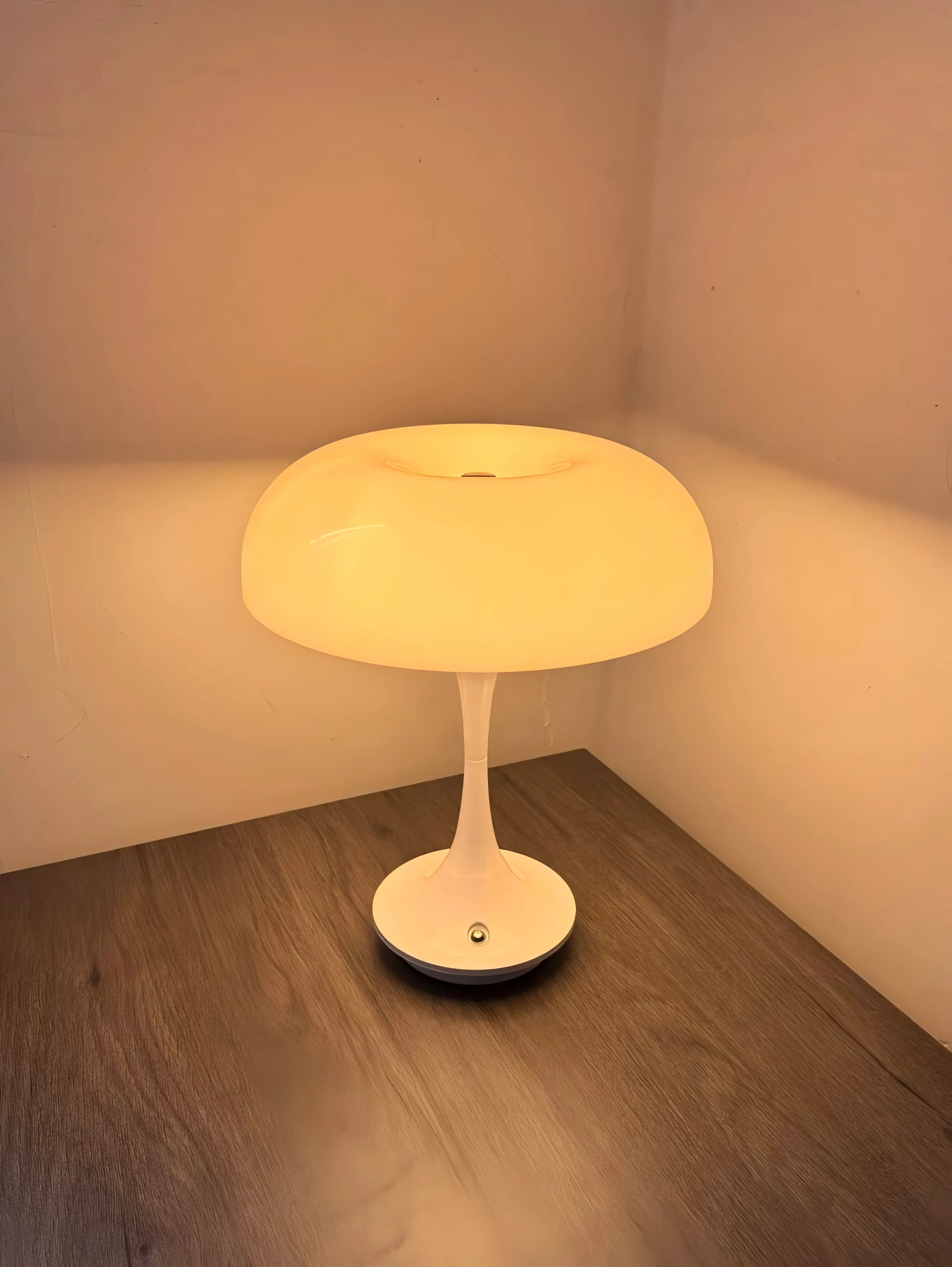 Mushroom Table Lamp glowing warm amber on a nightstand