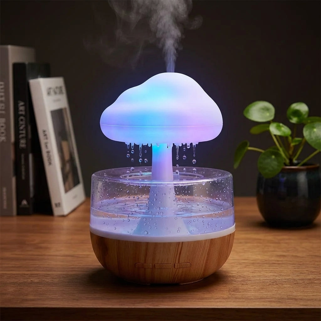 Raining Cloud Aromatherapy Humidifier glowing on a minimal desk